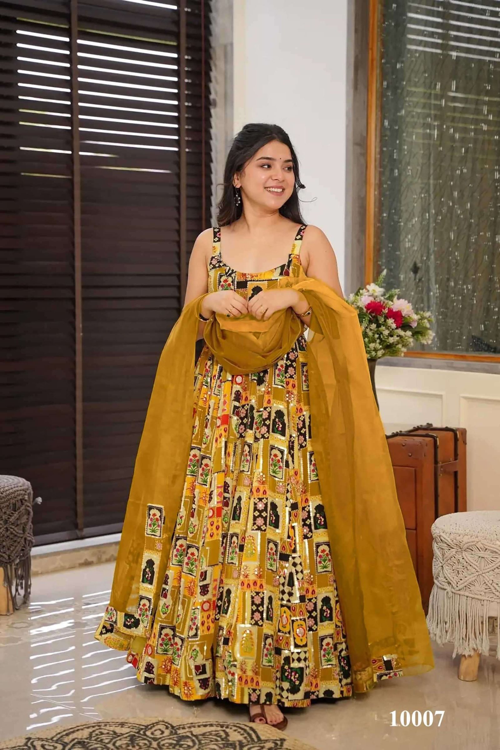 CLORA VOL-10 BY SUSWANI FANCY DESIGNER HEAVY SILK PRINTED GOWNS